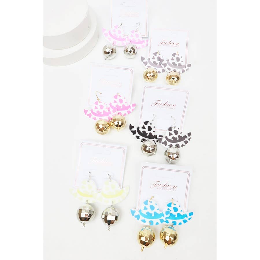 Set of earrings on cards with decorative patterns on a white background