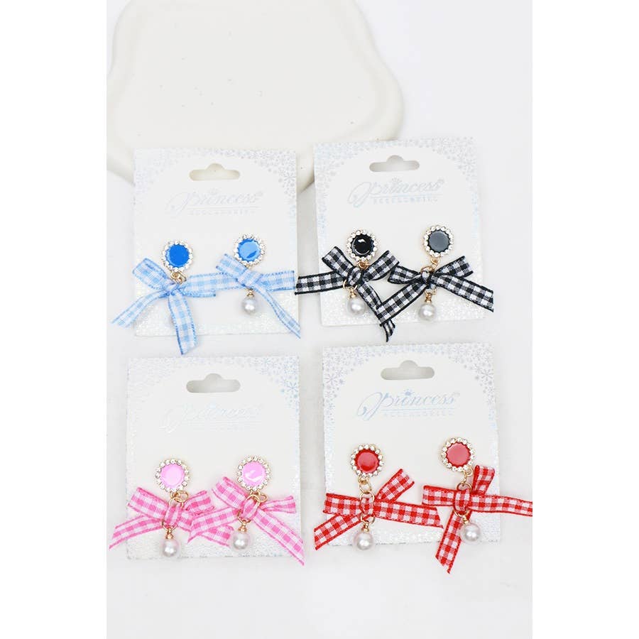Set of four pairs of earrings with bows on white cards
