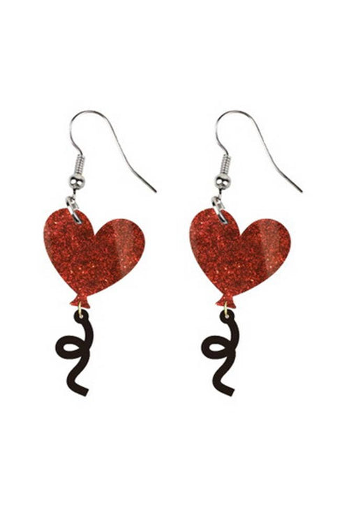 Heart-shaped earrings with red glittery hearts and black ribbons on a white background