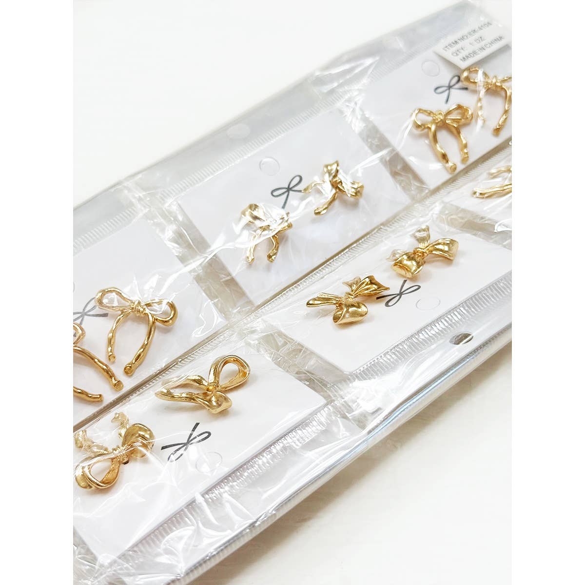 4-Kind Pretty Gold Bow Earrings